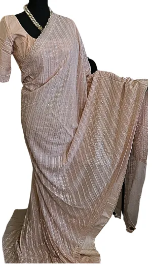 Pastel pink Sequin crepe saree with prestitched blouses