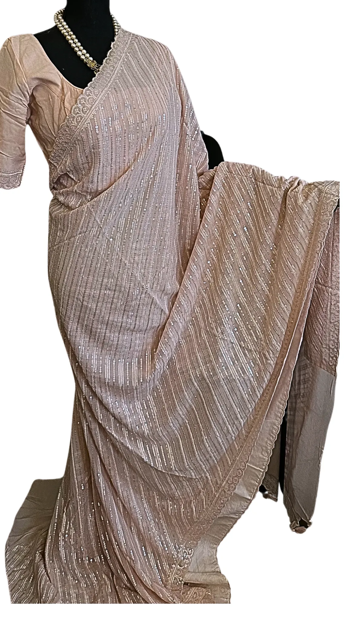 Pastel pink Sequin crepe saree with prestitched blouses
