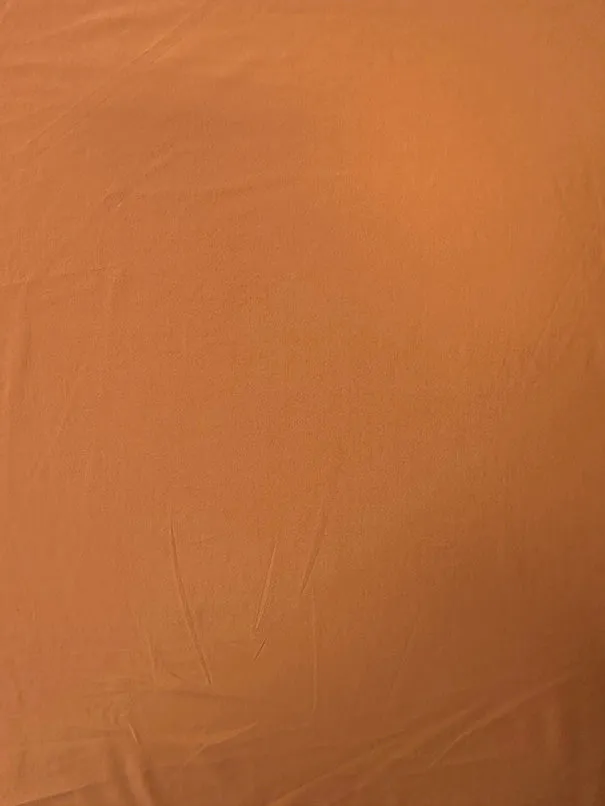 Tangerine Solid ITY Jersey Knit Fabric
